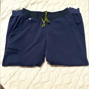 Figs scrub pants, Zamora jogger, color is “Quiet Navy” size is medium petite